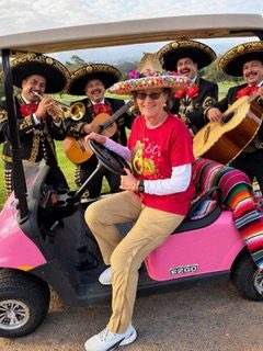 Leila and mariachi band head for the hills.